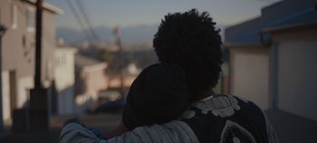 Movie still from “Nana - King’s Blvd” (2020), directed by Andrew Litten – Close Up shot, Over the shoulder angle