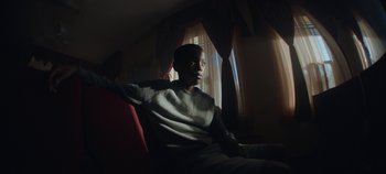 Movie still from “Nana - King’s Blvd” (2020), directed by Andrew Litten – Medium shot, Low angle