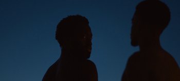 Movie still from “Nana - King’s Blvd” (2020), directed by Andrew Litten – Extreme Close Up shot, Over the shoulder angle