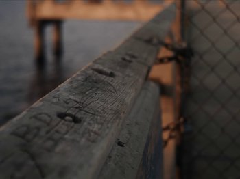 Movie still from “Sam Dew - NTWFL” (2020), directed by Young Replicant – Extreme Close Up shot, High angle