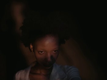 Movie still from “Sam Dew - NTWFL” (2020), directed by Young Replicant – Extreme Close Up shot, Low angle