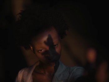 Movie still from “Sam Dew - NTWFL” (2020), directed by Young Replicant – Extreme Close Up shot, High angle