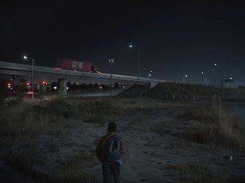 Movie still from “Sam Dew - NTWFL” (2020), directed by Young Replicant – Extreme Wide shot, Low angle