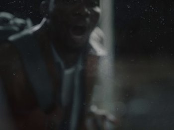 Movie still from “Sam Dew - NTWFL” (2020), directed by Young Replicant – Extreme Close Up shot, Low angle