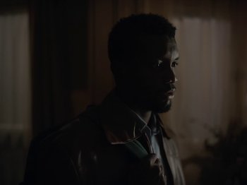 Movie still from “Sam Dew - NTWFL” (2020), directed by Young Replicant – Close Up shot, Over the shoulder angle