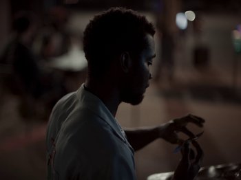 Movie still from “Sam Dew - NTWFL” (2020), directed by Young Replicant – Close Up shot, Low angle