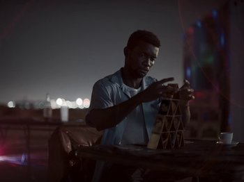 Movie still from “Sam Dew - NTWFL” (2020), directed by Young Replicant – Close Up shot, Low angle