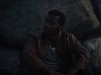 Movie still from “Sam Dew - NTWFL” (2020), directed by Young Replicant – Close Up shot, Low angle