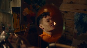 Movie still from “Declan J Donovan - Perfectly Imperfect” (2020), directed by Dan French – Close Up shot, Over the shoulder angle