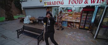 Movie still from “Ghetts feat. Skepta - IC3” (2020), directed by Hector Dockrill – Wide shot, Over the shoulder angle