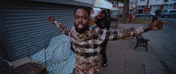 Movie still from “Ghetts feat. Skepta - IC3” (2020), directed by Hector Dockrill – Medium shot, Low angle