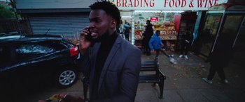 Movie still from “Ghetts feat. Skepta - IC3” (2020), directed by Hector Dockrill – Medium shot, Over the shoulder angle