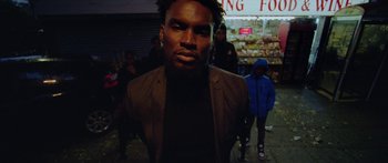 Movie still from “Ghetts feat. Skepta - IC3” (2020), directed by Hector Dockrill – Close Up shot, Low angle