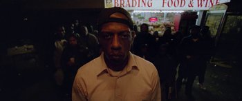 Movie still from “Ghetts feat. Skepta - IC3” (2020), directed by Hector Dockrill – Close Up shot, Low angle