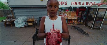 Movie still from “Ghetts feat. Skepta - IC3” (2020), directed by Hector Dockrill – Medium shot, High angle