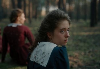 Movie still from “Katarzia - Even Water Burns” (2020), directed by Jay Walker – Close Up shot, Over the shoulder angle