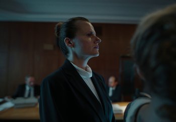 Movie still from “Katarzia - Even Water Burns” (2020), directed by Jay Walker – Medium shot, Low angle