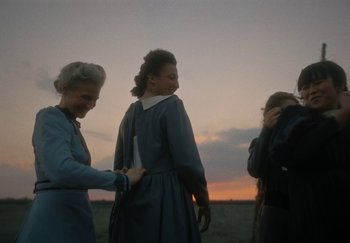 Movie still from “Katarzia - Even Water Burns” (2020), directed by Jay Walker – Medium shot, Low angle