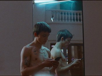Movie still from “NOISY - I Wish I Was A” (2020), directed by João Retorta – Medium shot, Low angle