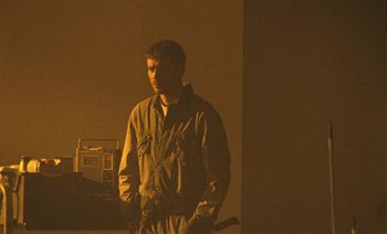 Movie still from “HUSKY - Never-Ever” (2020), directed by Evgenii Bakirov – Medium shot, Low angle