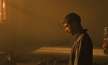 Movie still from “HUSKY - Never-Ever” (2020), directed by Evgenii Bakirov – Medium shot, Low angle