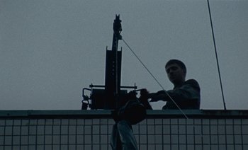 Movie still from “HUSKY - Never-Ever” (2020), directed by Evgenii Bakirov – Medium shot, Low angle