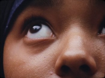 Movie still from “Jorja Smith - By Any Means” (2020), directed by Otis Dominique – Extreme Close Up shot, Overhead angle