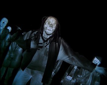 Movie still from “Flatbush ZOMBiES - Afterlife” (2020), directed by Arnaud Bresson – Medium shot, Low angle