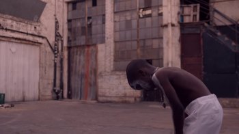 Movie still from “Beyoncé (Trailer) - Black Is King” (2020), directed by Jenn Nkiru – Medium shot, Low angle