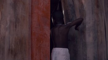 Movie still from “Beyoncé (Trailer) - Black Is King” (2020), directed by Jenn Nkiru – Medium shot, Low angle