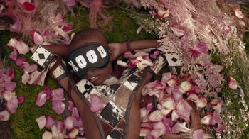 Movie still from “Beyoncé (Trailer) - Black Is King” (2020), directed by Jenn Nkiru – Medium shot, Overhead angle