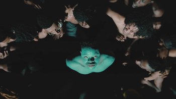 Movie still from “Beyoncé (Trailer) - Black Is King” (2020), directed by Jenn Nkiru – Medium shot, Overhead angle