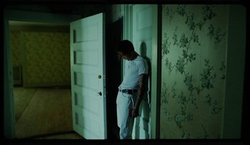 Movie still from “AYIA - Easy” (2020), directed by Salomon Ligthelm – Medium shot, Overhead angle