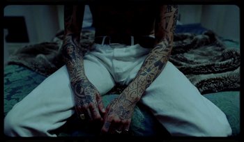 Movie still from “AYIA - Easy” (2020), directed by Salomon Ligthelm – Medium shot, Overhead angle