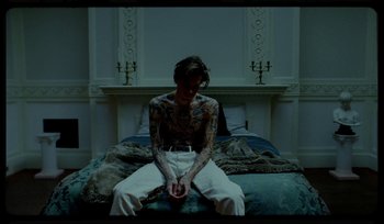 Movie still from “AYIA - Easy” (2020), directed by Salomon Ligthelm – Medium shot, Overhead angle