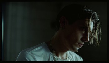 Movie still from “AYIA - Easy” (2020), directed by Salomon Ligthelm – Close Up shot, Low angle