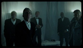 Movie still from “AYIA - Easy” (2020), directed by Salomon Ligthelm – Medium shot, Low angle