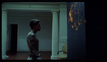 Movie still from “AYIA - Easy” (2020), directed by Salomon Ligthelm – Medium shot, Low angle