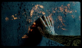 Movie still from “AYIA - Easy” (2020), directed by Salomon Ligthelm – Extreme Close Up shot, Overhead angle