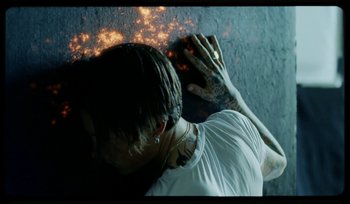 Movie still from “AYIA - Easy” (2020), directed by Salomon Ligthelm – Close Up shot, Low angle