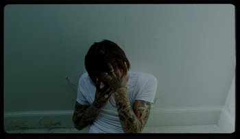 Movie still from “AYIA - Easy” (2020), directed by Salomon Ligthelm – Medium shot, High angle