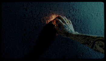 Movie still from “AYIA - Easy” (2020), directed by Salomon Ligthelm – Extreme Close Up shot, Overhead angle