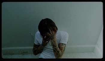 Movie still from “AYIA - Easy” (2020), directed by Salomon Ligthelm – Medium shot, High angle