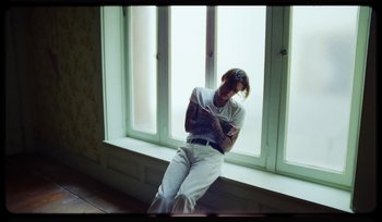 Movie still from “AYIA - Easy” (2020), directed by Salomon Ligthelm – Medium shot, High angle