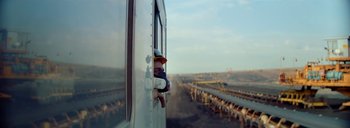 Movie still from “Woodkid - Goliath” (2020), directed by Yoann Lemoine – Extreme Close Up shot, Low angle