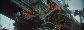 Movie still from “Woodkid - Goliath” (2020), directed by Yoann Lemoine – Extreme Wide shot, Low angle