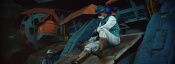 Movie still from “Woodkid - Goliath” (2020), directed by Yoann Lemoine – Wide shot, Low angle