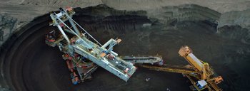 Movie still from “Woodkid - Goliath” (2020), directed by Yoann Lemoine – Extreme Wide shot, Overhead angle