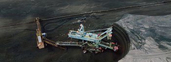 Movie still from “Woodkid - Goliath” (2020), directed by Yoann Lemoine – Extreme Wide shot, Overhead angle
