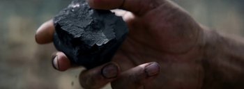 Movie still from “Woodkid - Goliath” (2020), directed by Yoann Lemoine – Extreme Close Up shot, Overhead angle